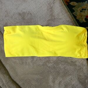 Bright yellow tube top bathing suit